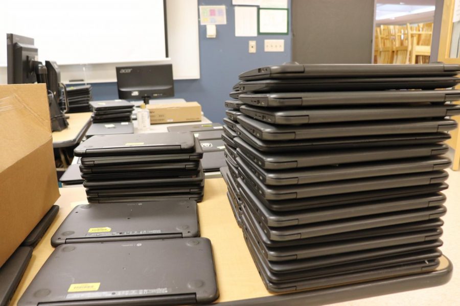The stacks are endless of student Chromebooks needing repairs.