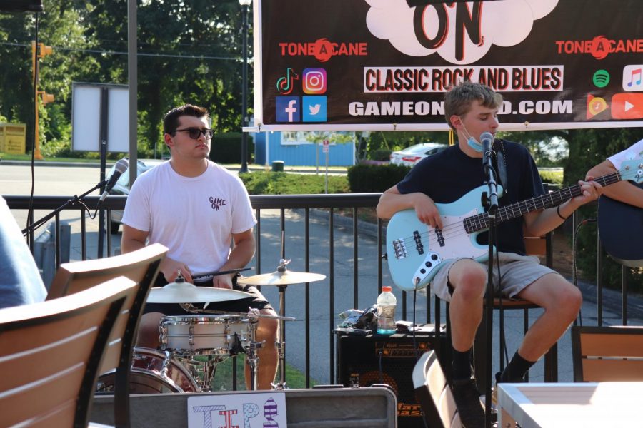 Seniors AJ Dionne and Carter Ramsey on drums and bass, respectively.